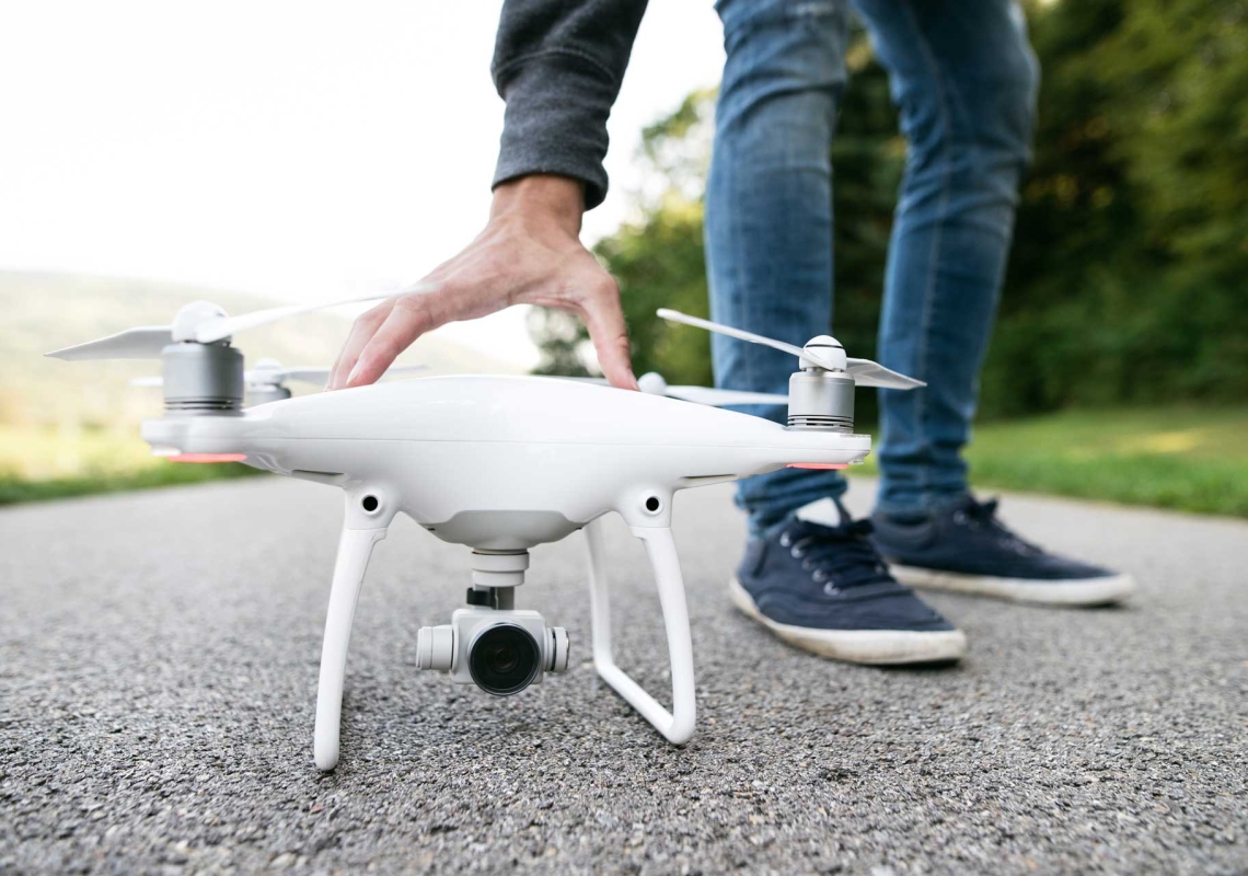 unrecognizable-man-with-drone-sunny-green-nature-c-PKFLLWC.jpg unrecognizable-man-with-drone-sunny-green-nature-c-PKFLLWC.jpg